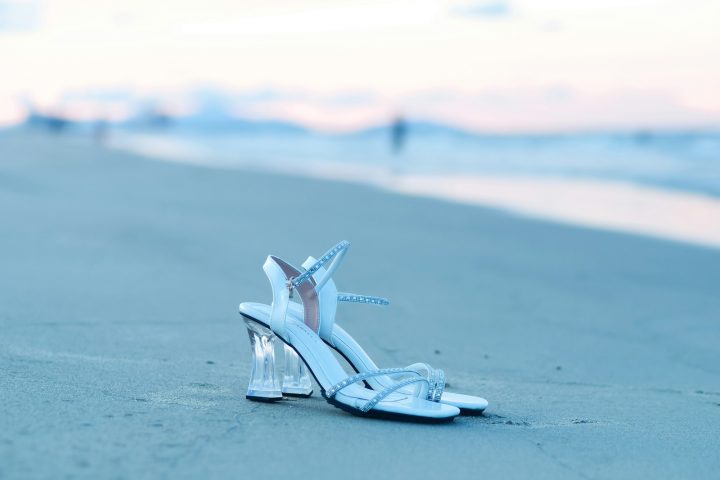 a small model airplane on a beach